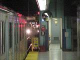 T-1 waits for subway train to cross over onto next platform